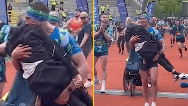 Heartwarming moment Kevin Sinfield lifts Rob Burrow from wheelchair and carries him over marathon finish line