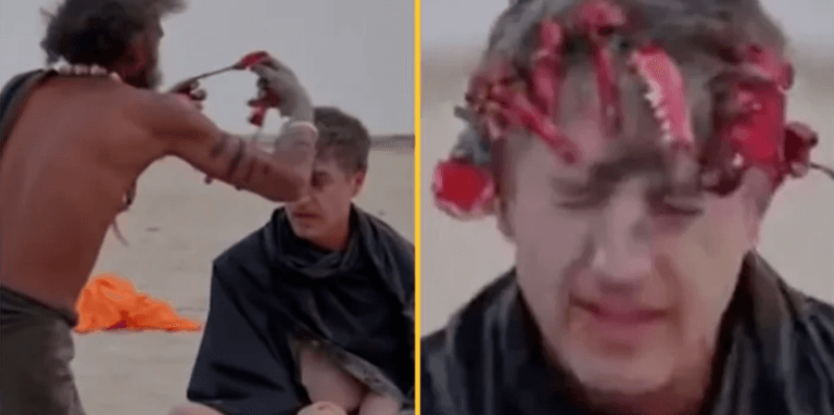 Reporter eats ‘human brain’ with cannibal tribe while wearing crown made out of teeth